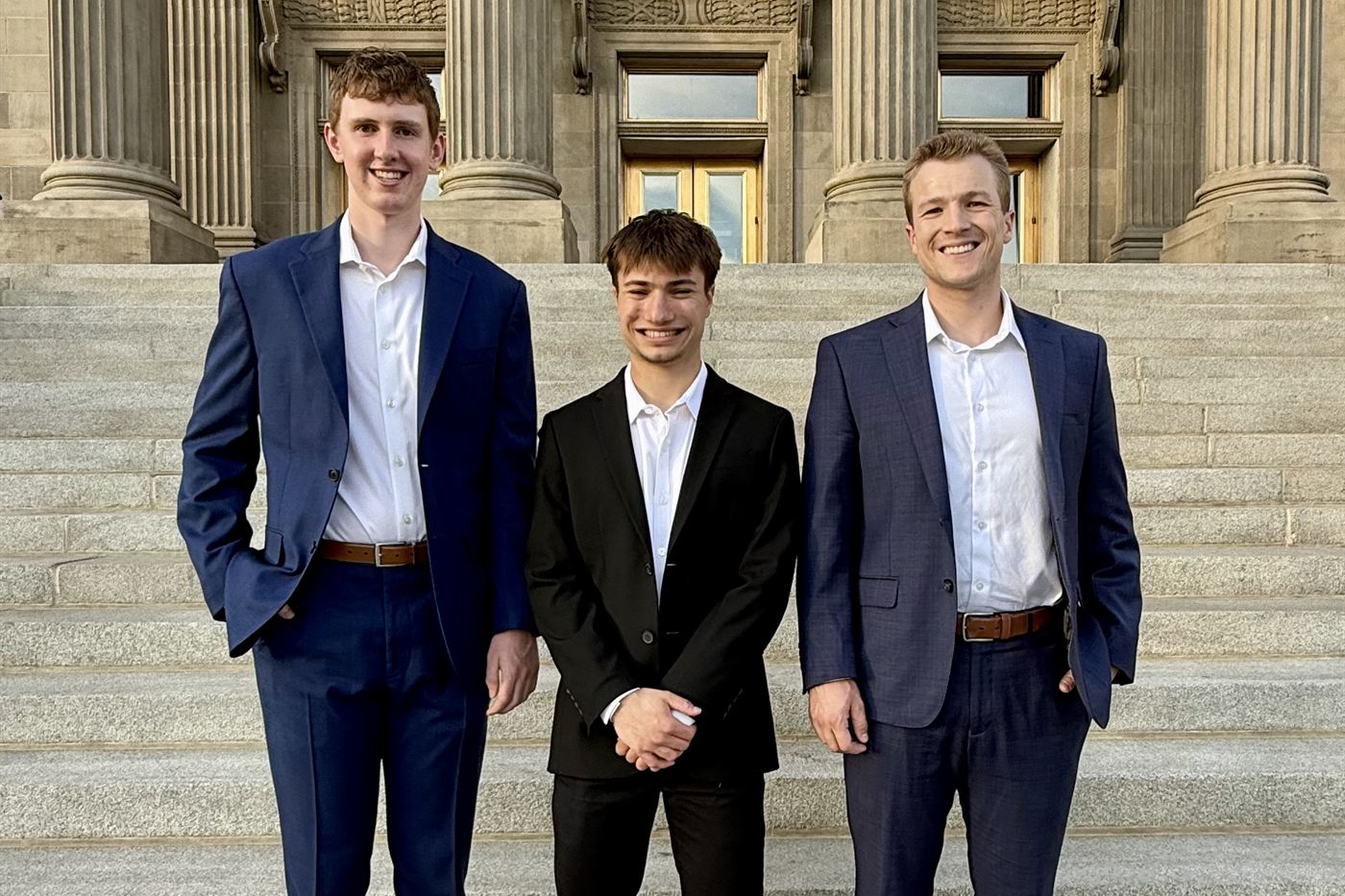 Owen Barnes, Jacob Adler and Chuck Dickinson on the Capitol steps in Boise, Idaho